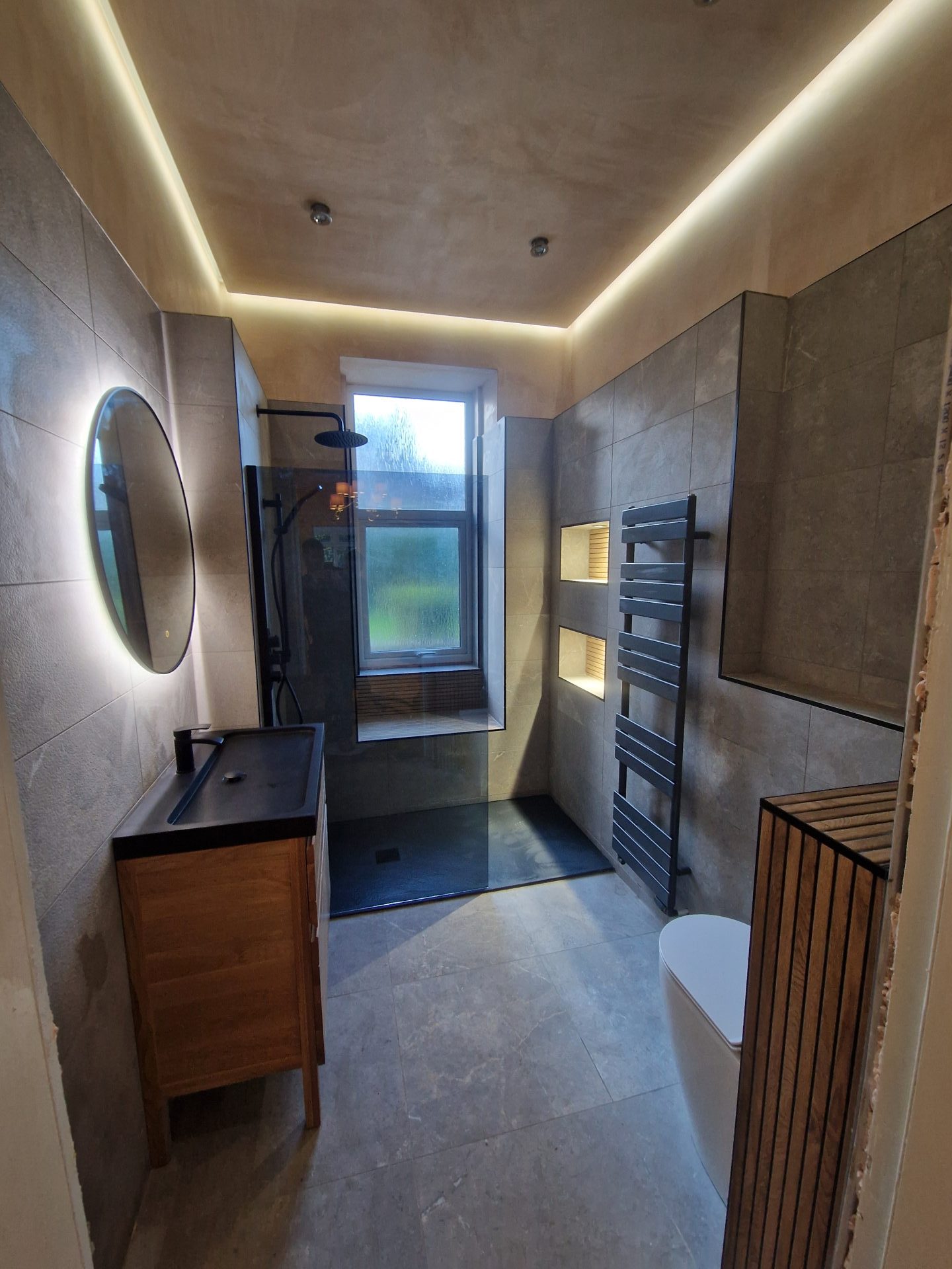 Contemporary bathroom featuring a sleek design and recessed lighting